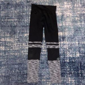 Just One Black and Grey stretch pants size M. No seam in crotch.